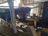 Used Baker Model C- 6” wide x 12” high capacity 4 Head Horizontal Resaw Line