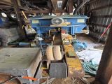 Used Baker Model C- 6” wide x 12” high capacity 4 Head Horizontal Resaw Line