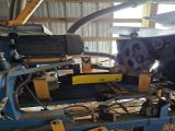 Used Baker Model C- 6” wide x 12” high capacity 4 Head Horizontal Resaw Line